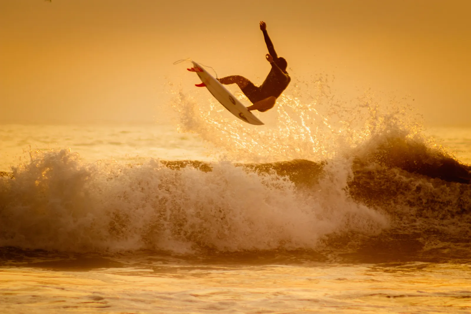 Surfer at golden hour